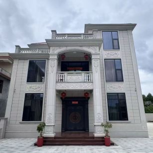 巴彦淖尔 芝麻白石材别墅干挂案例展示